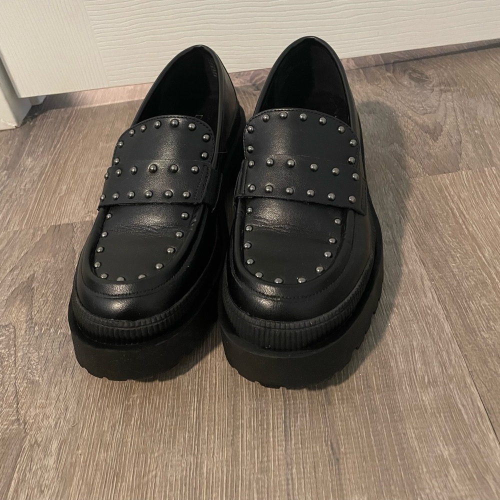 Black loafers